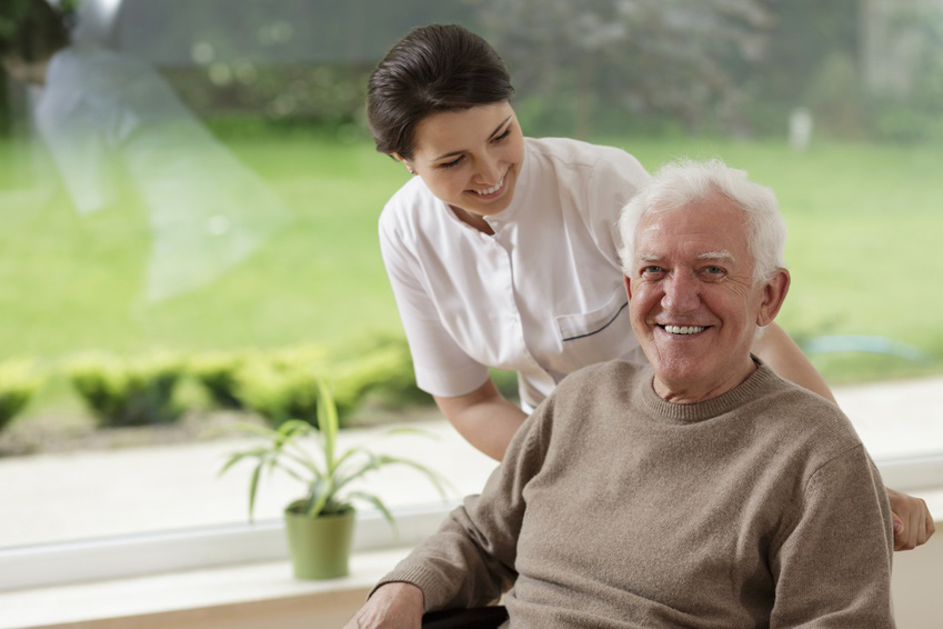 Nurse helping a senior citizen