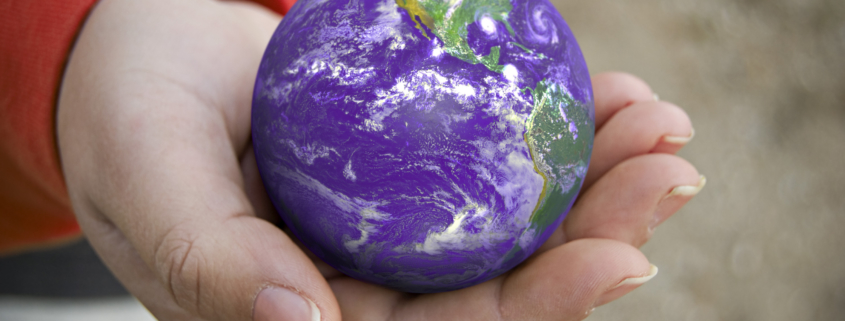 a conceptual image with the earth resting in the palm of this persons hand SFBlScPASo