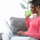 bigstock Black woman using a laptop whi 43147306