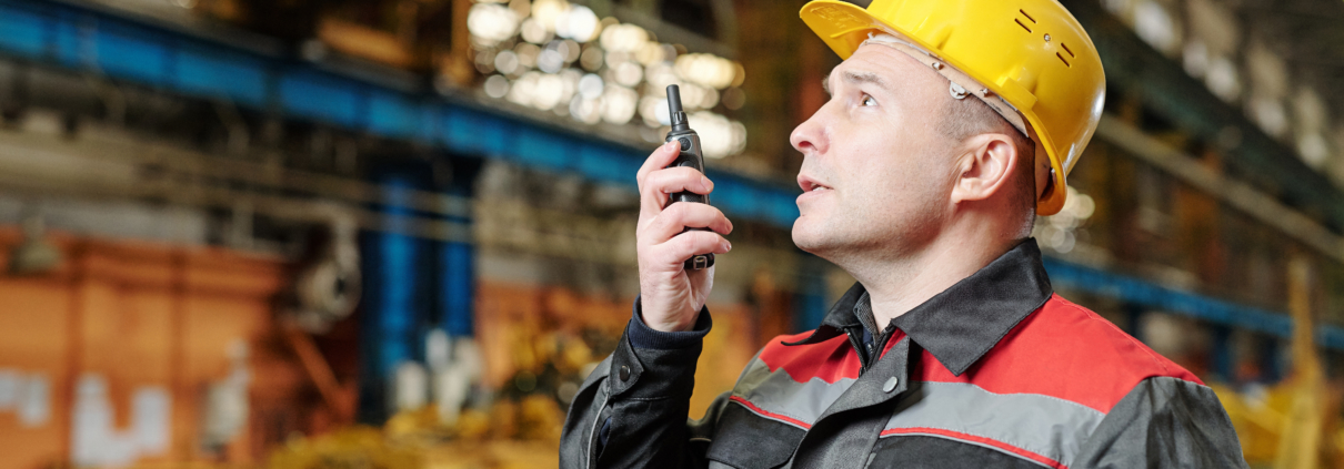 Worker using a walkie talkie 981858 scaled